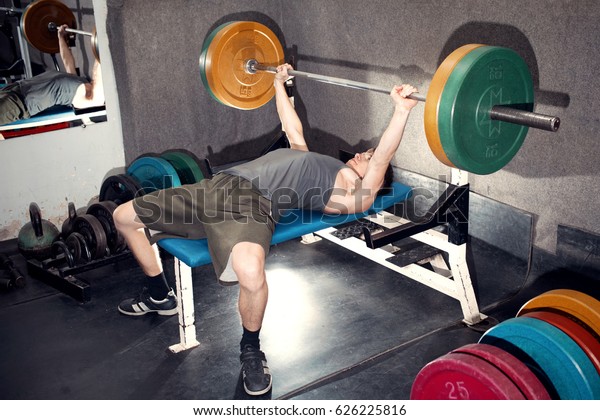 Young Man Performs Bench Press Barbell Stock Photo Edit Now