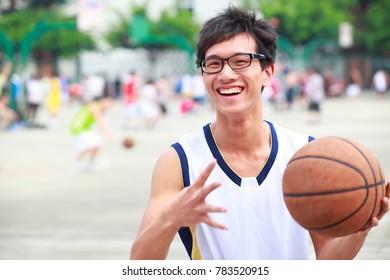 Young Man Playing Basketball Portrait
