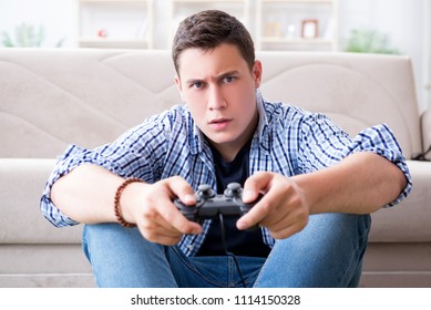 Young Man Playing Computer Games Home Stock Photo (Edit Now) 1109725154