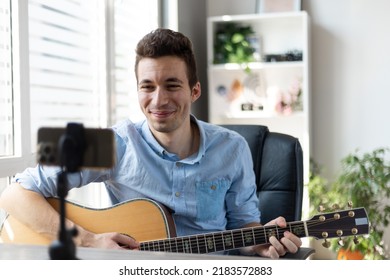 Young Man Playing Guitar, Musician Artist Recording New Song, Making Music In Home Studio, Using Laptop, Teacher Holding Online Lesson