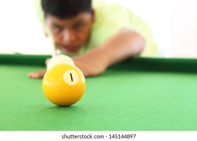 Young Man Playing Pool