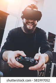The young man plays a game at the office. Virtual reality