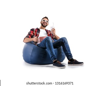 Young Man With Popcorn Watching Comedy Movie On White Background