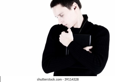 Young man posing with computer
