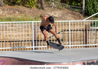 Young man practicing in skateboarding
