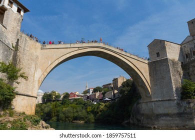 A Young Man Is Preparing To Jump From The Old Bridge In Mostar. Bosnia And Herzegovina. 20 September 2018