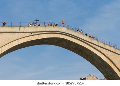 A Young Man Is Preparing To Jump From The Old Bridge In Mostar. Bosnia And Herzegovina. 20 September 2018