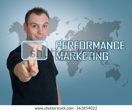 Young man press digital Performance Marketing button on interface in front of him