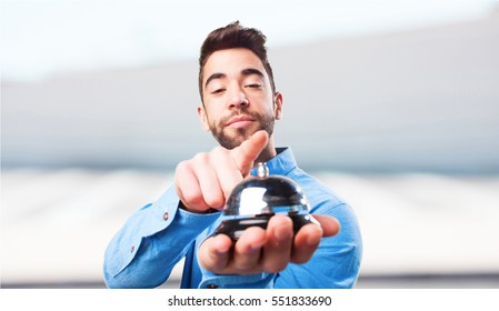 Young Man Pressing Ring Bell