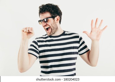 Young Man Pretending To Sing On White Background