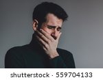 Young man with a problem crying