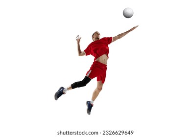 Young man, professional athlete in red uniform in motion, hitting ball in jump, playing volleyball against white studio background. Concept of sport, active lifestyle, health, dynamics, game, ad - Powered by Shutterstock