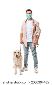 Young Man In Protective Mask And With Cute Dog On White Background