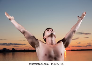 	Young the man pulls hands to the sky