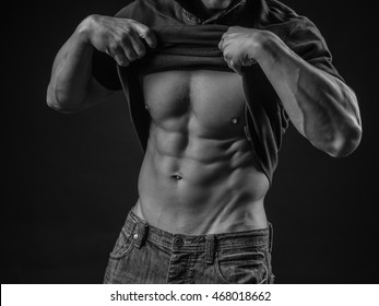 Young Man Pulls Up His Shirt To Expose Perfect Abs