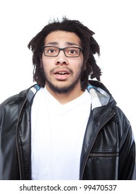 Young Man With Rasta Hair Looking Bedazzled Over White Background.