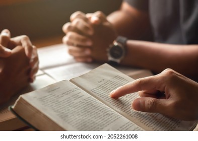 Young Man Reading Bible With Friends Who Are Praying To God Join The Cell Group At The Church. A Small Group Of Christians Or Concepts In A Church At A Church.