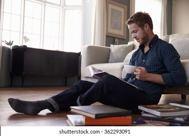 Young Man Reading Books