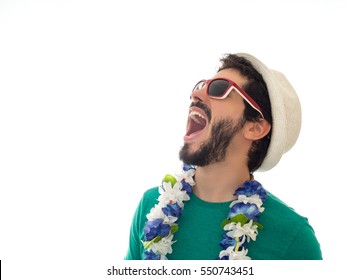 Young man ready for the revelry. Wearing sunglasses, hat and flower necklace. White background. - Shutterstock ID 550743451