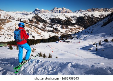 Young man ready for skiing in Dolomity super ski resort, Italy, Europe. 