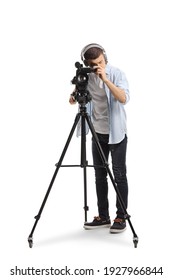Young Man Recording With A Camera On A Tripod Stand Isolated On White Background