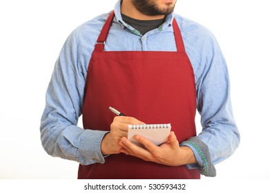 Young man with red apron taking an order on white background - Powered by Shutterstock