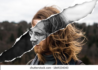 young man with red long hair outdoors in the wind on torn paper