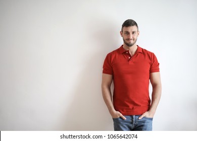 Young Man In Red Polo Shirt
