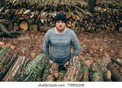 young man with Redhead  beard, and cap