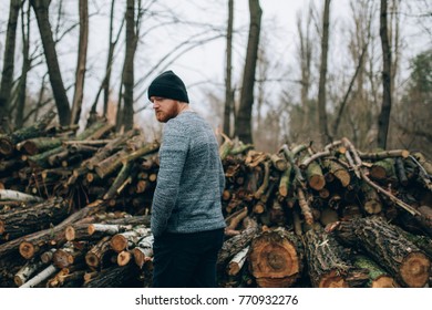 young man with Redhead  beard, and cap