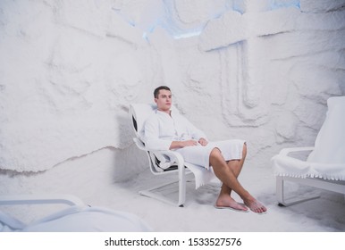 A young man is resting in the salt room, Spa treatments for men with respiratory disorders, inhalation Procedure in the Olean grotto