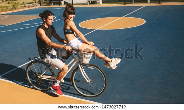 girl sitting on bike