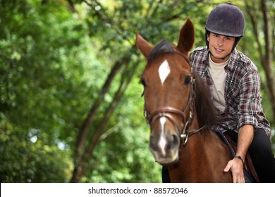 Young Man Riding Horse