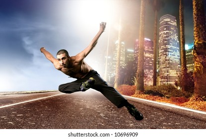 A Young Man Run And Dance On The Street