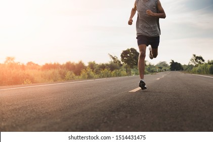 Young Man runner athlete running jogging at road. - Shutterstock ID 1514431475