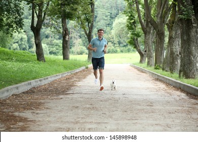 Young Man Running With Your Dog