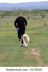 A young man running with your dog