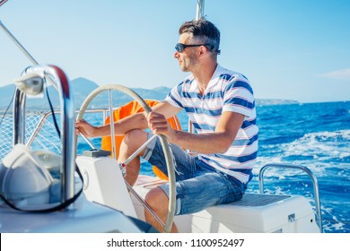 Young Man Sailing Yacht Steering Wheel Vacation Sail Holidays People Travel