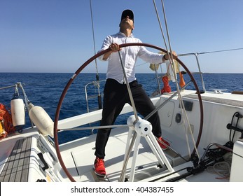 Young Man Sailing Yacht Steering Wheel Vacation Sail Holidays People Travel