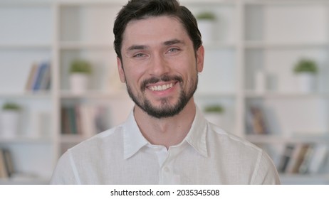 Young Man Saying Yes By Shaking Head