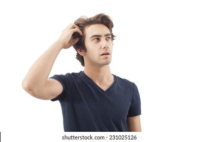 Young Man Scratching His Head