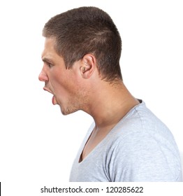 Young Man Shouting In Profile On White Isolated Background