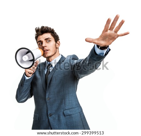 Young man shouting through a megaphone  / photos of young businessman wearing  a suit and tie over white background