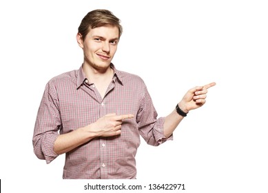 Young Man Showing Something. Studio Shot Of Young Man.