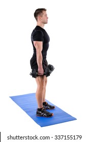 Young man shows starting position of both Standing Dumbbell Calf Raise with Dumbbels or Squats workout, isolated on white