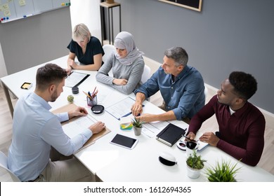 Young Man Sitting At Interview In Office - Shutterstock ID 1612694365