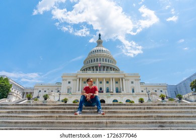 Young man sitting on the stairs by the United States Capitol in Washington, DC. - Powered by Shutterstock