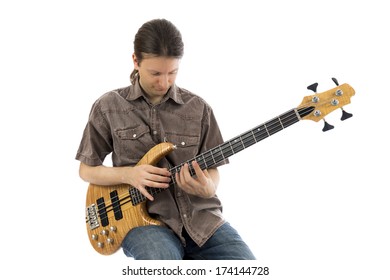 Young Man Is Sitting And Playing His Bass  (Series With The Same Model Available)