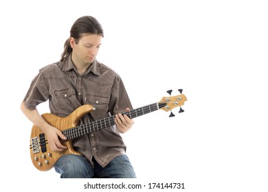 Young Man Is Sitting And Playing His Bass  (Series With The Same Model Available)