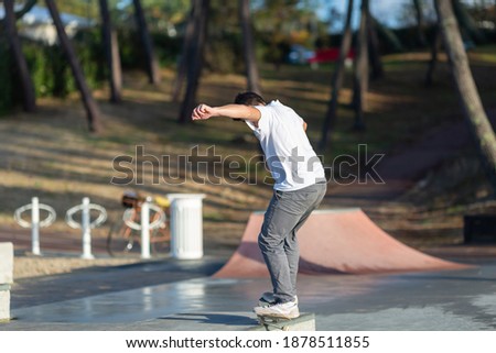 Similar – Junge Person mit Skateboard im Skatepark